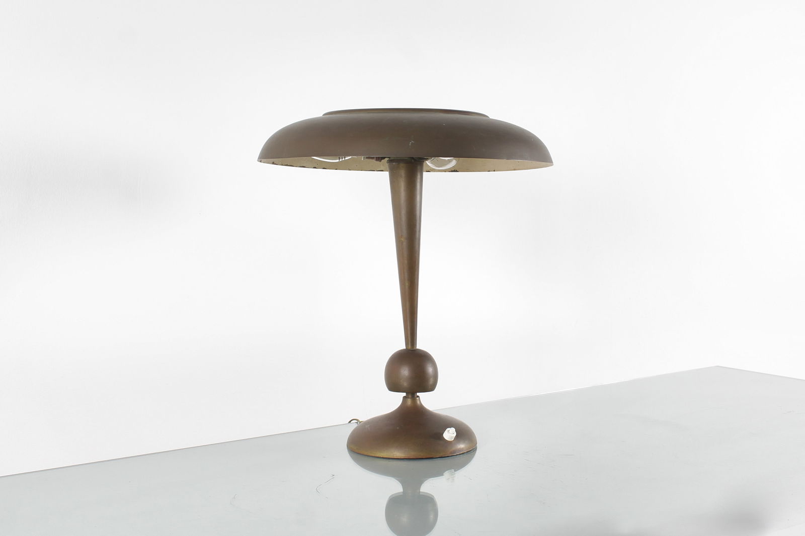 Oscar Torlasco Table lamp model 143: Diameter 36 cm Height 42 cm Brass and satin glass table lamp, adjustable, model 143 by Oscar Torlasco for Lumi Milano, 1950s. Bibliography: Lumi Catalog