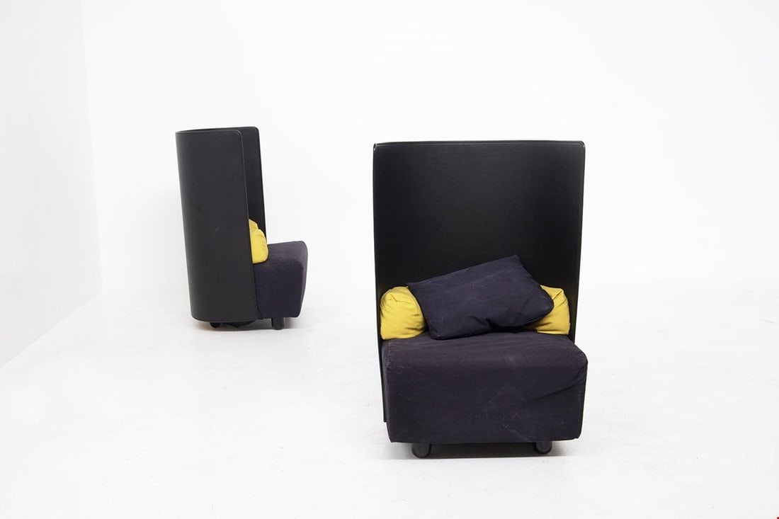 Jonathan De Pas - Donato D'Urbino , Black Armchairs: Height: 111 cm Width: 75 cm Depth: 70 cm Seat Height: 43 cmPair of armchairs made in the 1980s, Italian manufacture by De Pass, D'urbino e Lomazzi.The armchairs have a curved back in black plastic mat