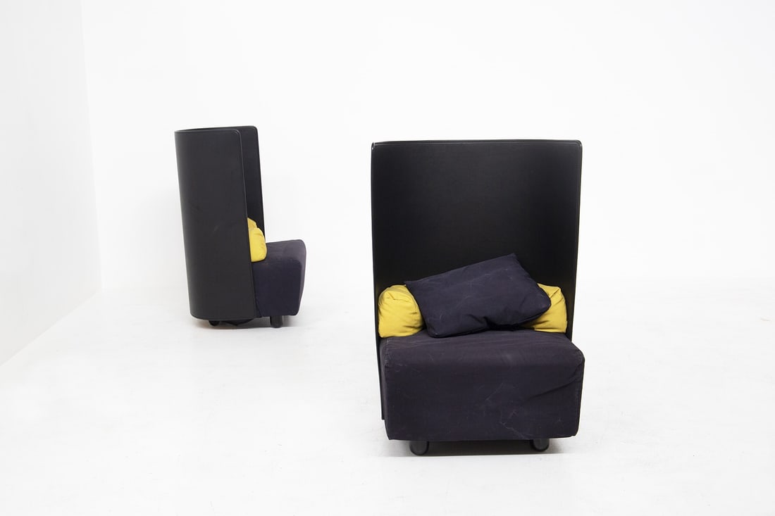Jonathan De Pas - Paolo Lomazzi - Donato D'Urbino , , Black Armchairs: Height: 111 cm Width: 75 cm Depth: 70 cm Seat Height: 43 cmPair of armchairs made in the 1980s, Italian manufacture by De Pass, D'urbino e Lomazzi.The armchairs have a curved back in black plastic mat