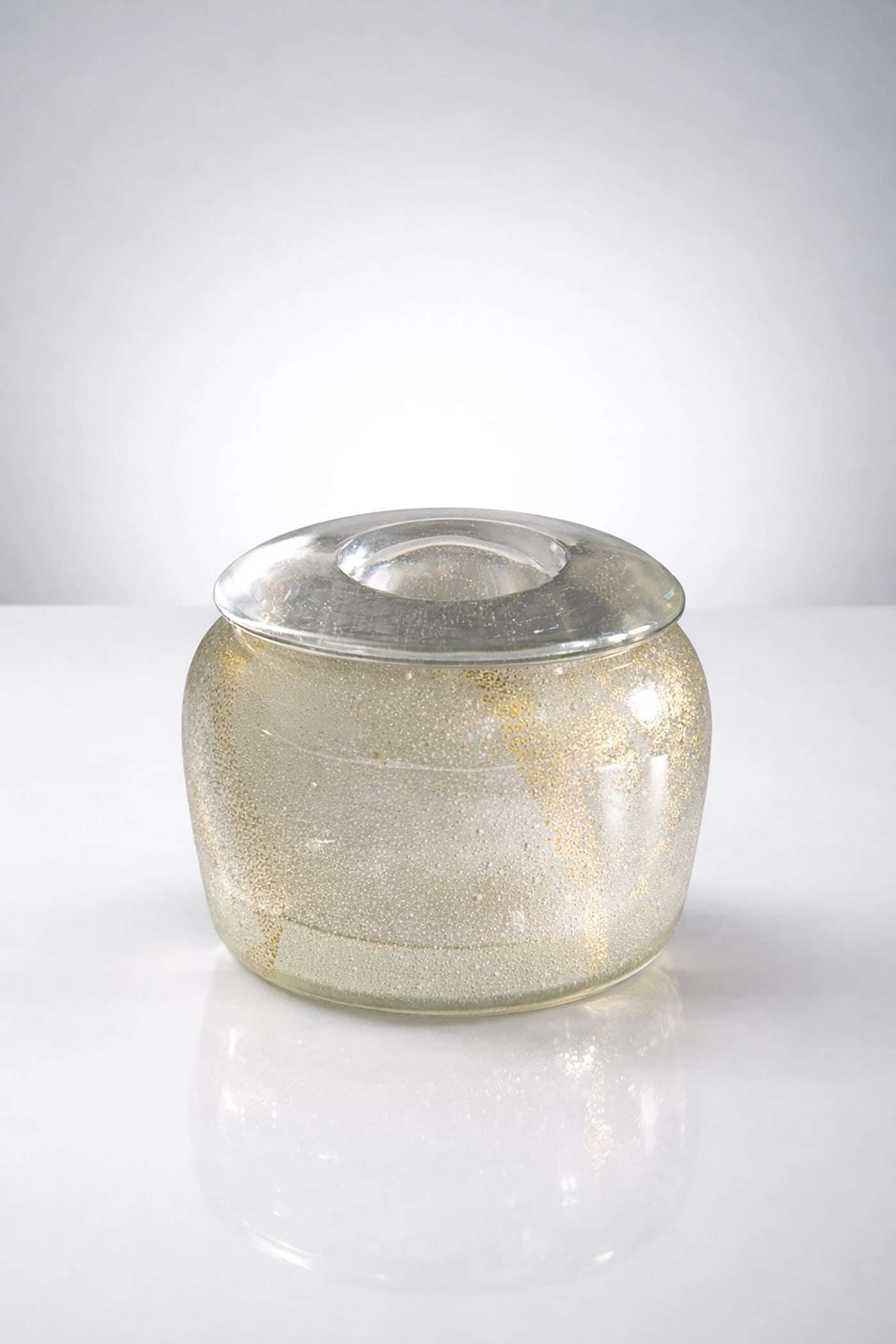 Carlo Scarpa Small Bottle: Height 6.5 cm, diameter 7.5 cmBottle with perfume stopper by Carlo Scarpa, submerged in bubbles, late 1930s. Acid-etched signature Venini Murano. We attach the publication