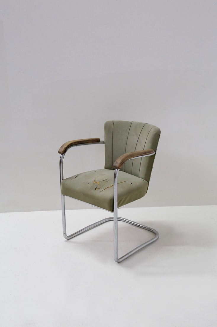 Columbus Armchair: Height: 77 cm Width: 54.5 cm Depth: 56 cm Columbus armchair in blue-green leather from the 1920s, for the motor ship Saturnia
