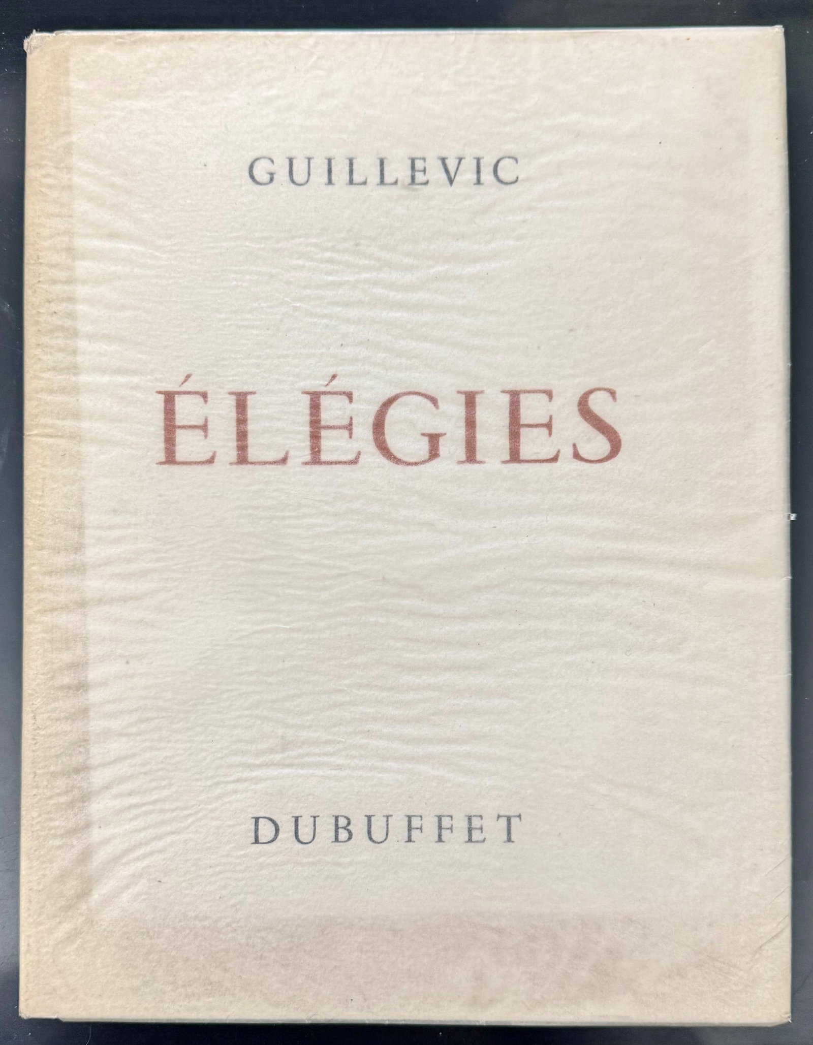 Elegies: GUILLEVIC, Eugene. Elegies. With a lithograph by Jean Dubuffet. Paris, Le Calligraphe, 1946. In-4?, loose sheets in original ivory publisher's folder with titles printed in red and grey. Original