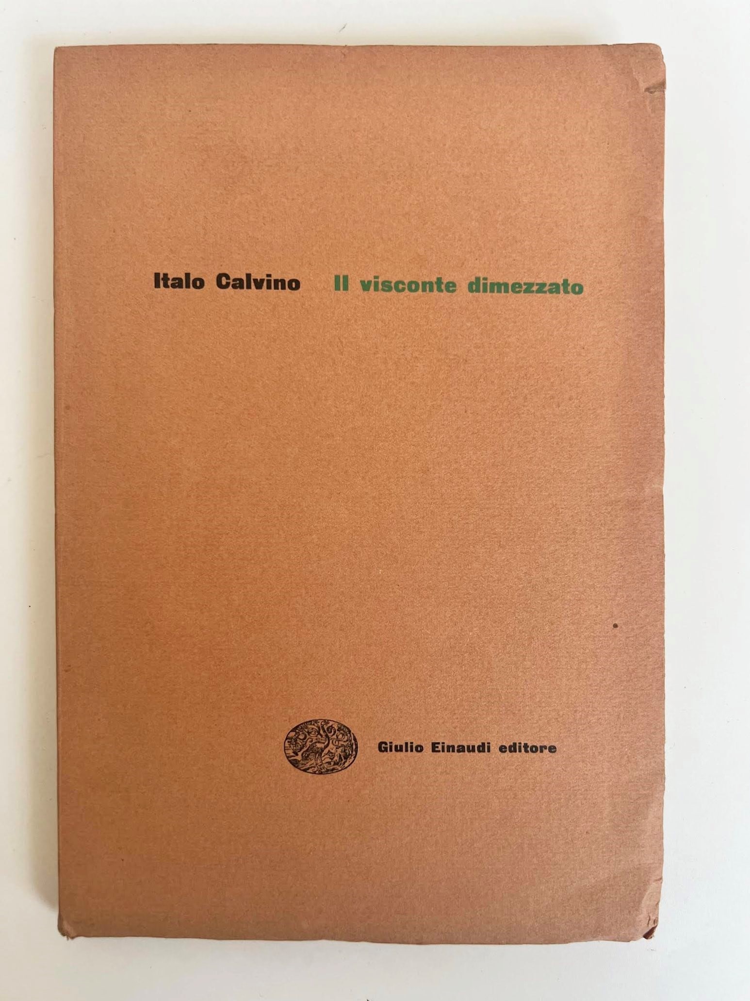 The Cloven Viscount: Italo Calvino, Il visconte dimezzato. Turin, Giulio Einaudi editore, 1952. First edition of the first novel in the celebrated trilogy 'Our Ancestors'. Original salmon-coloured publisher's wrappers wit
