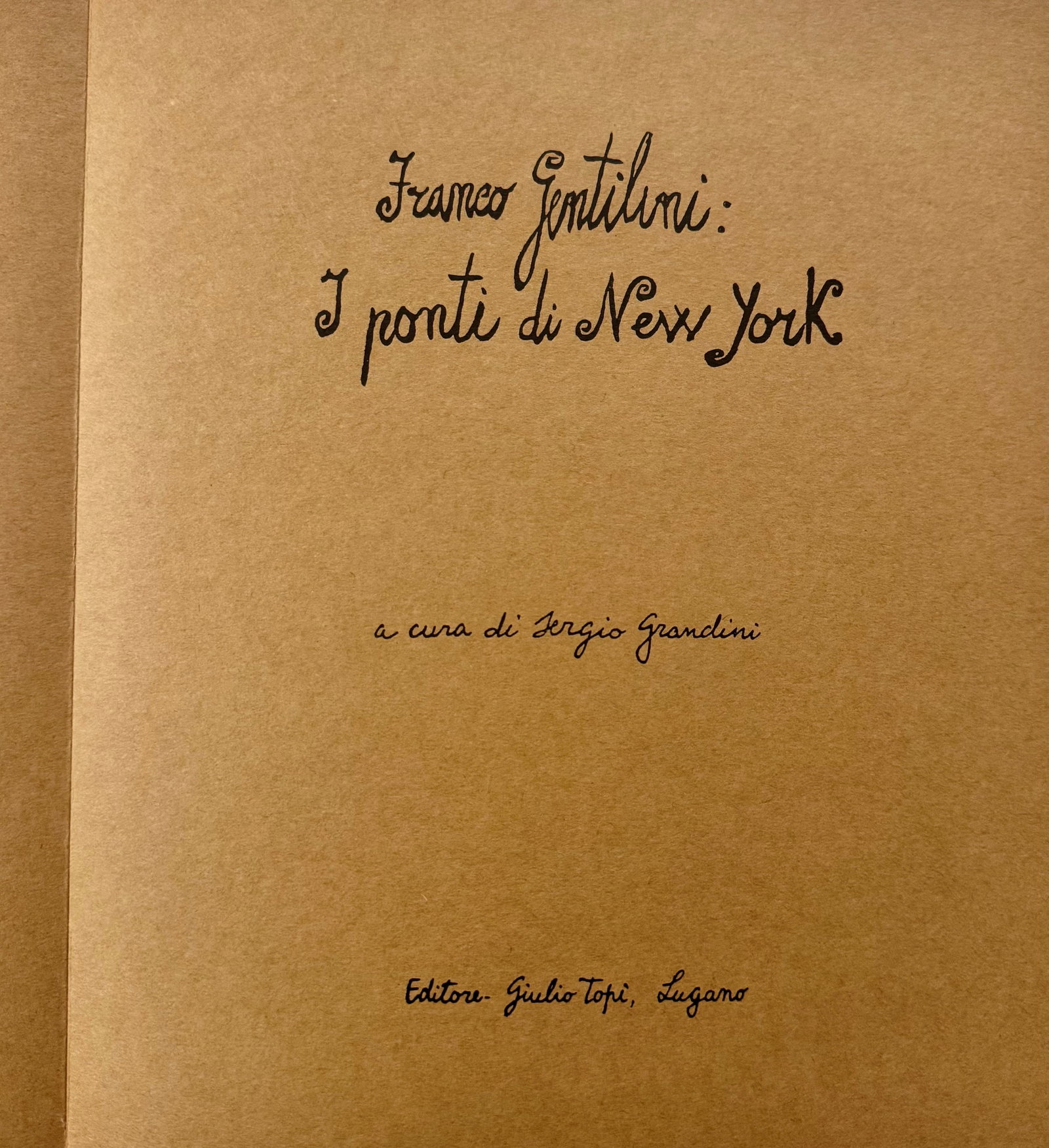 The Bridges of New York: GENTILINI, Franco. The Bridges of New York. Edited by Sergio Grandini. Lugano: Publisher Giulio Topi, [1965]. Oblong 4to. Publisher's binding in brown cloth with burgundy leather label on spine, gilt