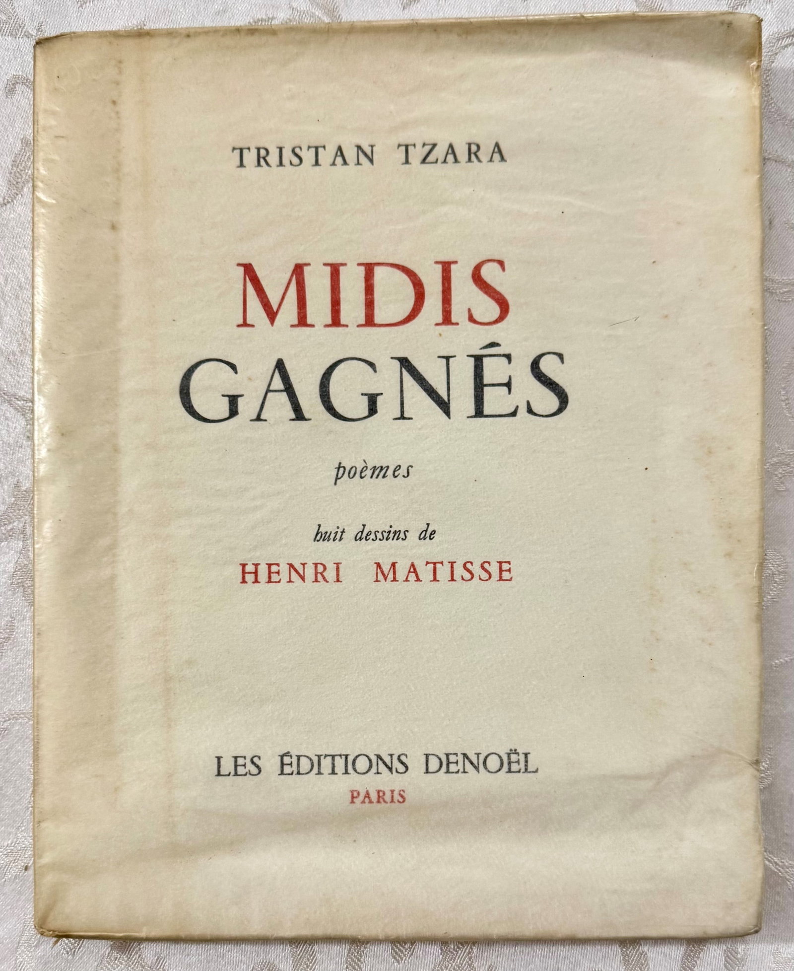 Midis gagnes: TZARA, Tristan. Midis gagnes. Poemes. Eight drawings by Henri Matisse. Paris, Les Editions Denoel, 1939. Quarto, original publisher's wrappers with title printed in red and black; uncut copy.