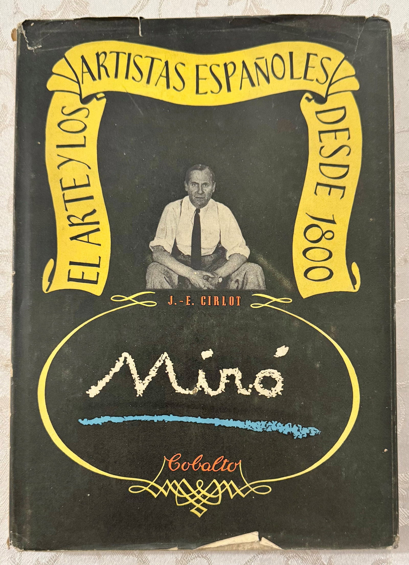 CIRLOT, Juan Eduardo, Miro: CIRLOT, Juan Eduardo. Miro. Barcelona, Editorial Cobalto, 1949. 4to, publisher's cloth binding in black with original illustrated dust jacket bearing the artist's reproduced autograph signature.