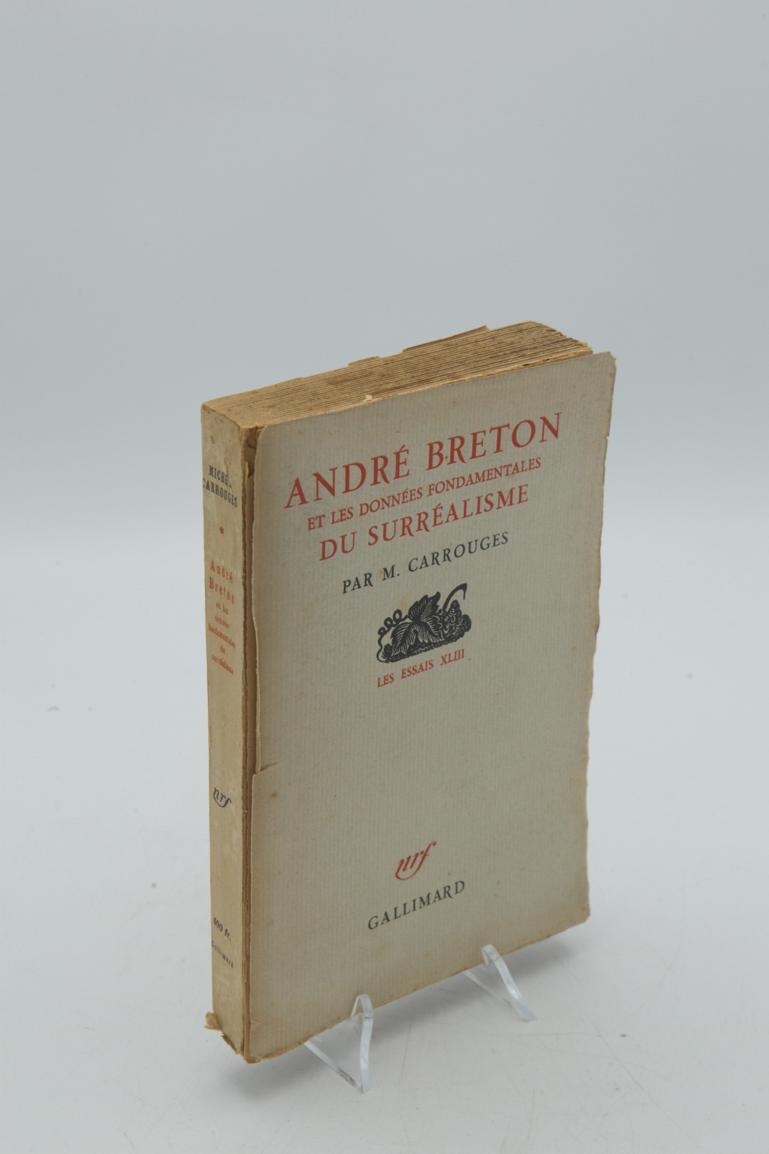 Andre Breton, Et les donnees fondamentales du surrealisme: An essay titled Andre Breton et les donnees fondamentales du surrealisme written by Michel Carrouges.It was published by Gallimard as part of the Les Essais series number XLIIIThis particular copy is