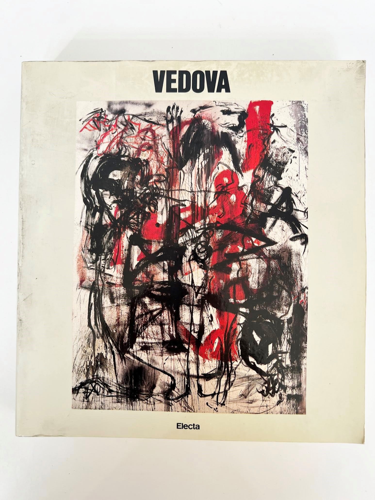 Vedova: VEDOVA. Electa, Milan 1984. Large 4to, illustrated publisher's wrappers with color reproduction of a gestural work by the Venetian artist. Introductory text by Giulio Carlo Argan, one of the most