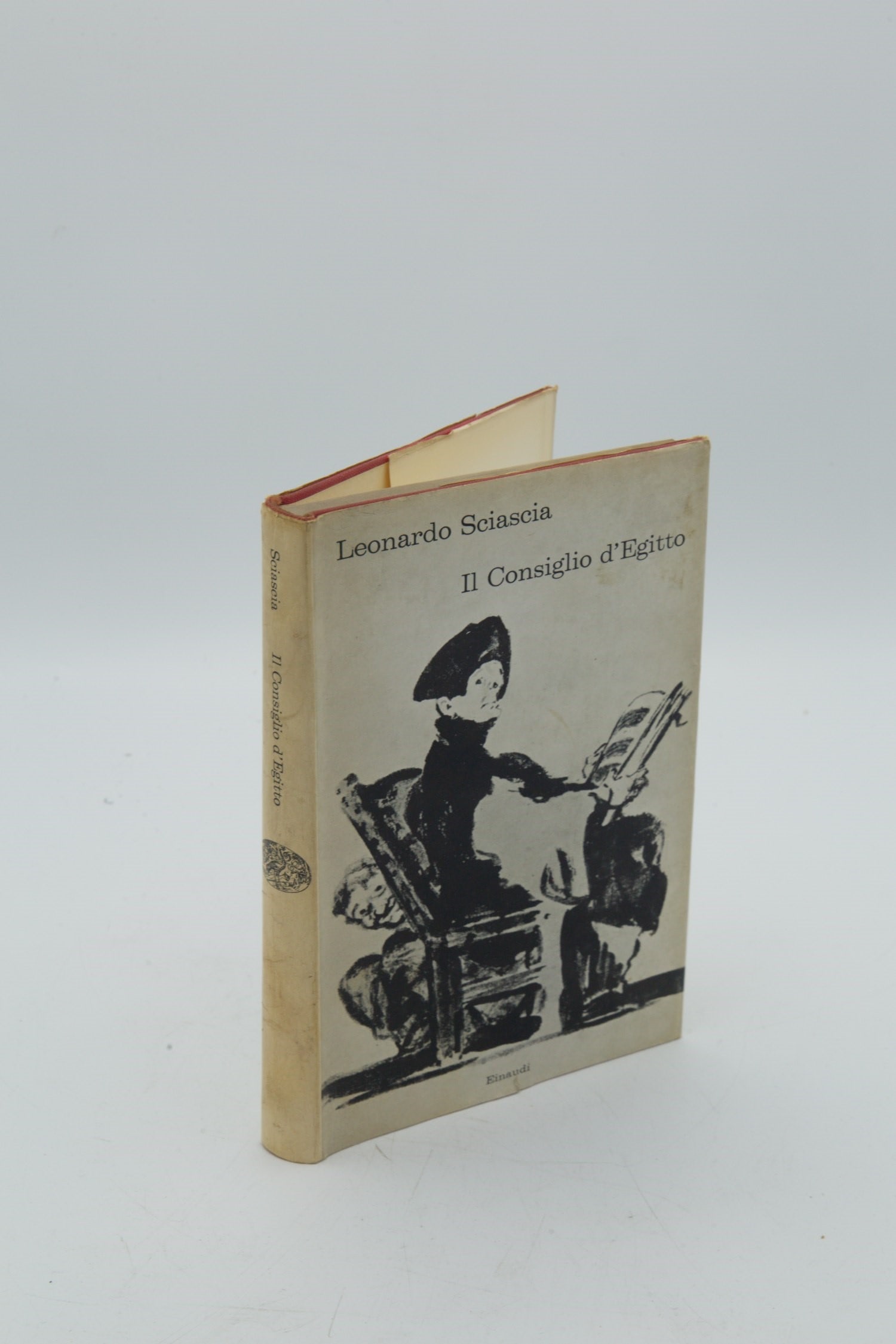 The Council of Egypt: SCIASCIA, Leonardo. Il Consiglio d'Egitto. Turin: Giulio Einaudi editore, 1963. First edition. 8vo, publisher's wrappers with original illustrated dust jacket depicting an eighteenth-century