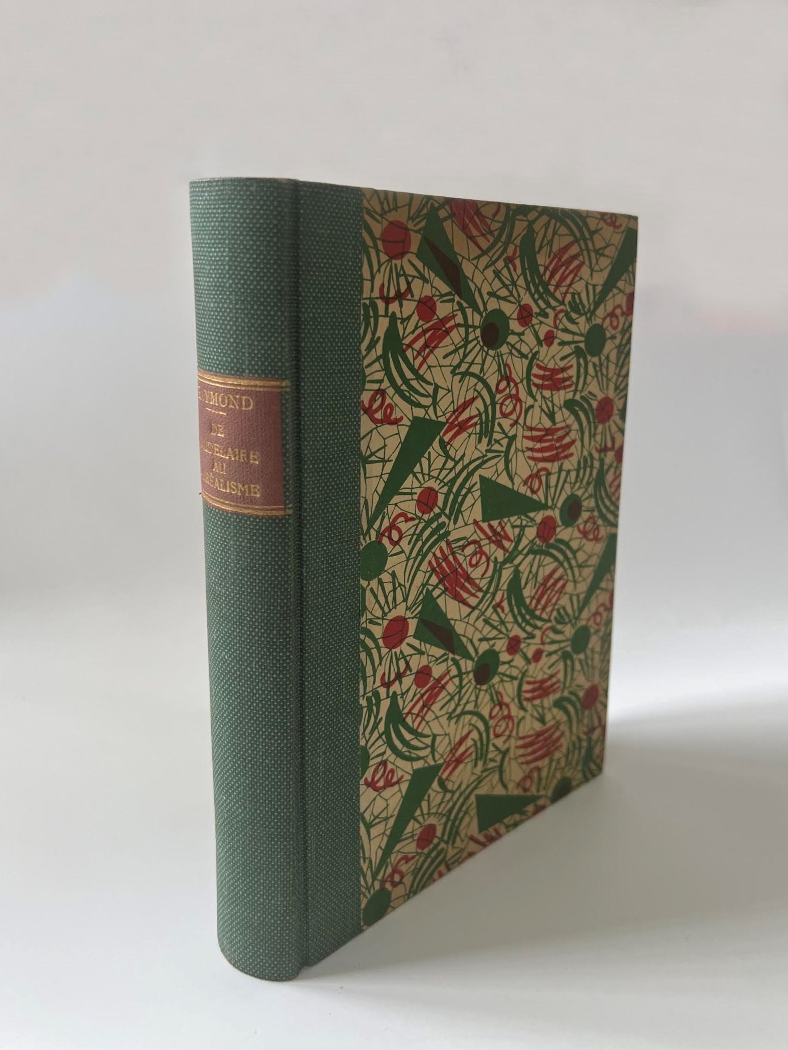 From Baudelaire to Surrealism: RAYMOND, Marcel. From Baudelaire to Surrealism. New revised and reworked edition. Paris: Librairie Jos? Corti, 11 Rue de M?dicis, 1940. 8vo, green half cloth with boards covered in polychrome