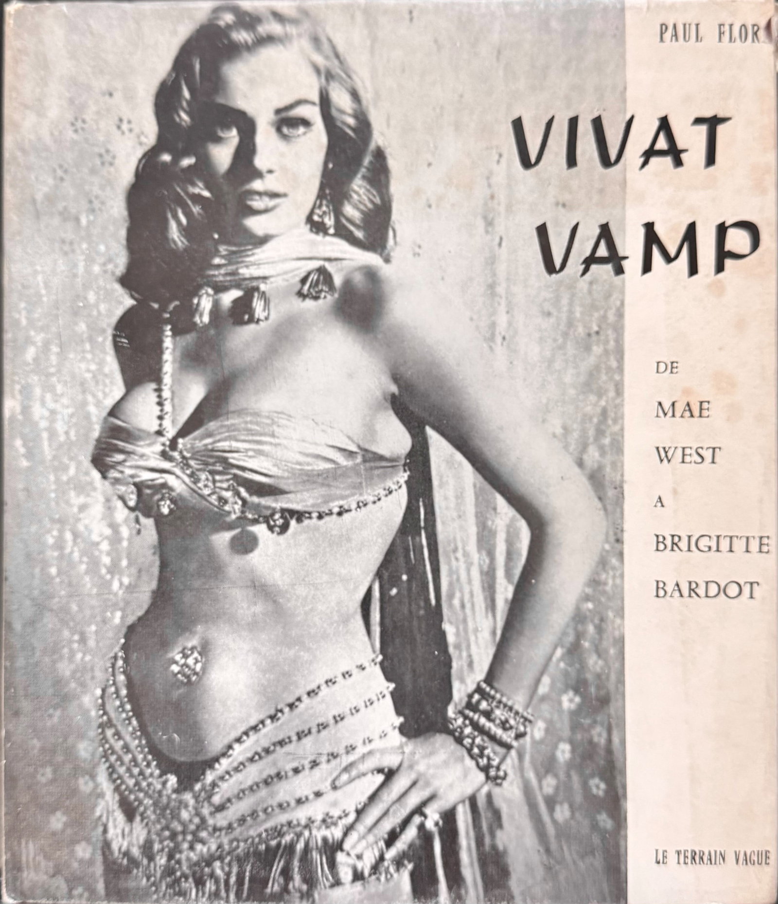 Vivat Vamp! From Mae West to Brigitte Bardot: FLORA, Paul. Vivat Vamp! De Mae West ? Brigitte Bardot. Drawn commentary by Paul Flora. Paris: Les ?ditions du Temps / Le Terrain Vague, [1960]. 4to, illustrated editorial paperback with original