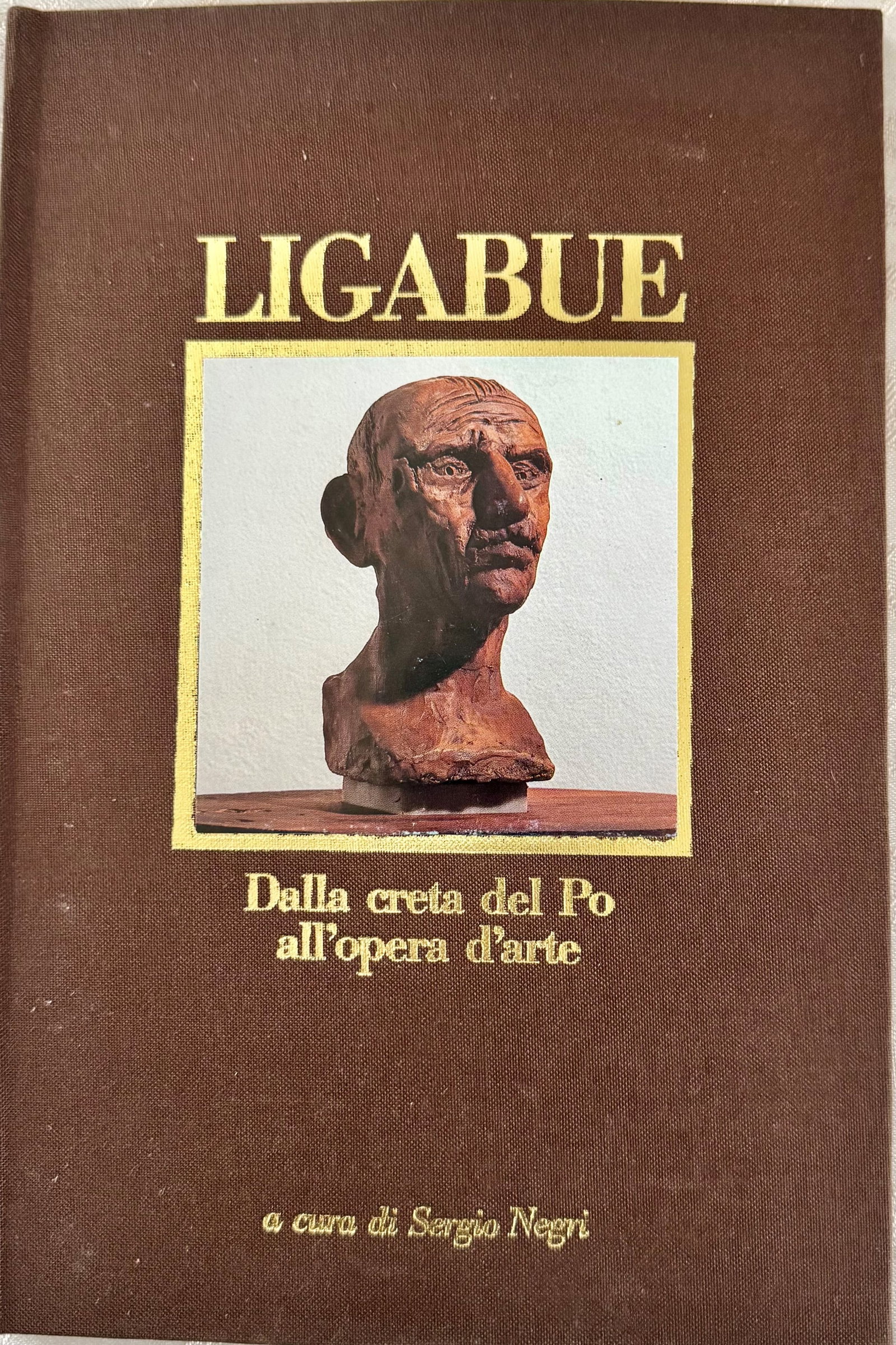Ligabue. From the Clay of the Po to the Work of Art: Rare monographic catalogue dedicated to the sculptural work of Antonio Ligabue (1899-1965), the most celebrated Italian na?f painter of the twentieth century, known for his tormented self-portraits