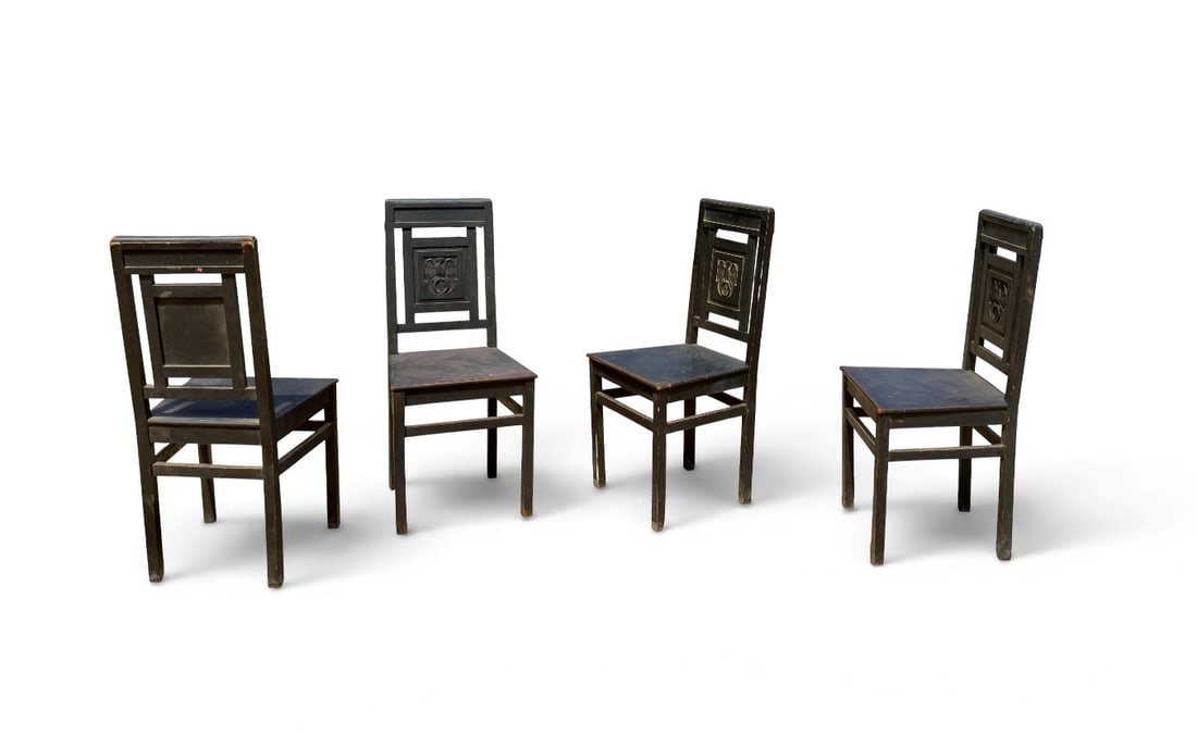 Manifattura Italiana Four chairs: Width: 45 cm Depth: 45 cm Height: 100 cm Seat height: 50 cmFour Art Nouveau chairs in black lacquered wood with a fasces motif. Italy, 1930s