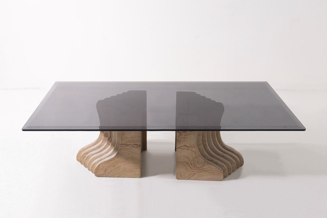 Carlo Scarpa Coffee table: Height: 41 cm Width: 140 cm Depth: 70 cmCarlo Scarpa coffee table from the 1970s with travertine pedestals and a dark glass top.