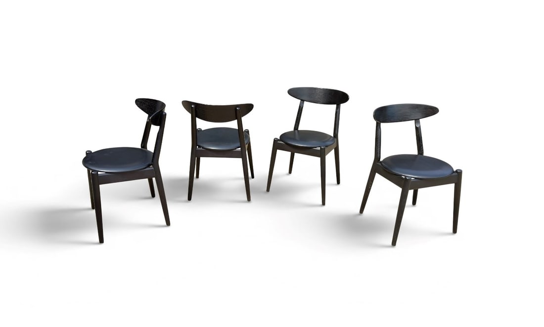 Ole Wanscher Set of four chairs: Width: 44 cm Depth: 43 cm Height: 76 cm Seat height: 43 cmSet of four black-stained wooden chairs designed by the renowned Danish architect and designer Ole Wanscher. Manufactured by Poul Jeppesen,