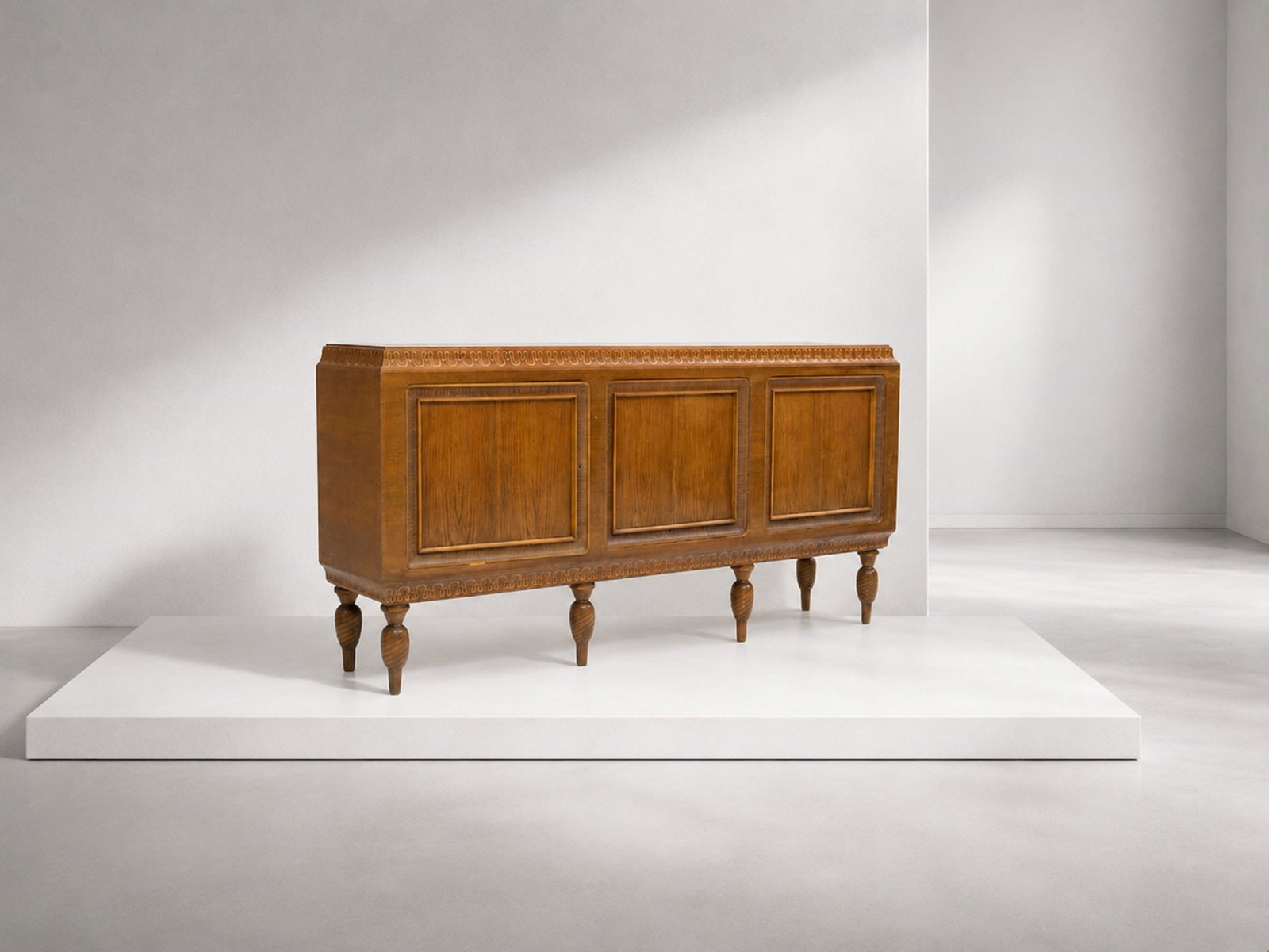 Aristide Valzania Wooden sideboard, original label: 50s sideboard of Valzania with original label. The sideboard is made of decorated and carved wood with elegant ornaments and decorations. Made with three doors, in the side doors we find inside elegan