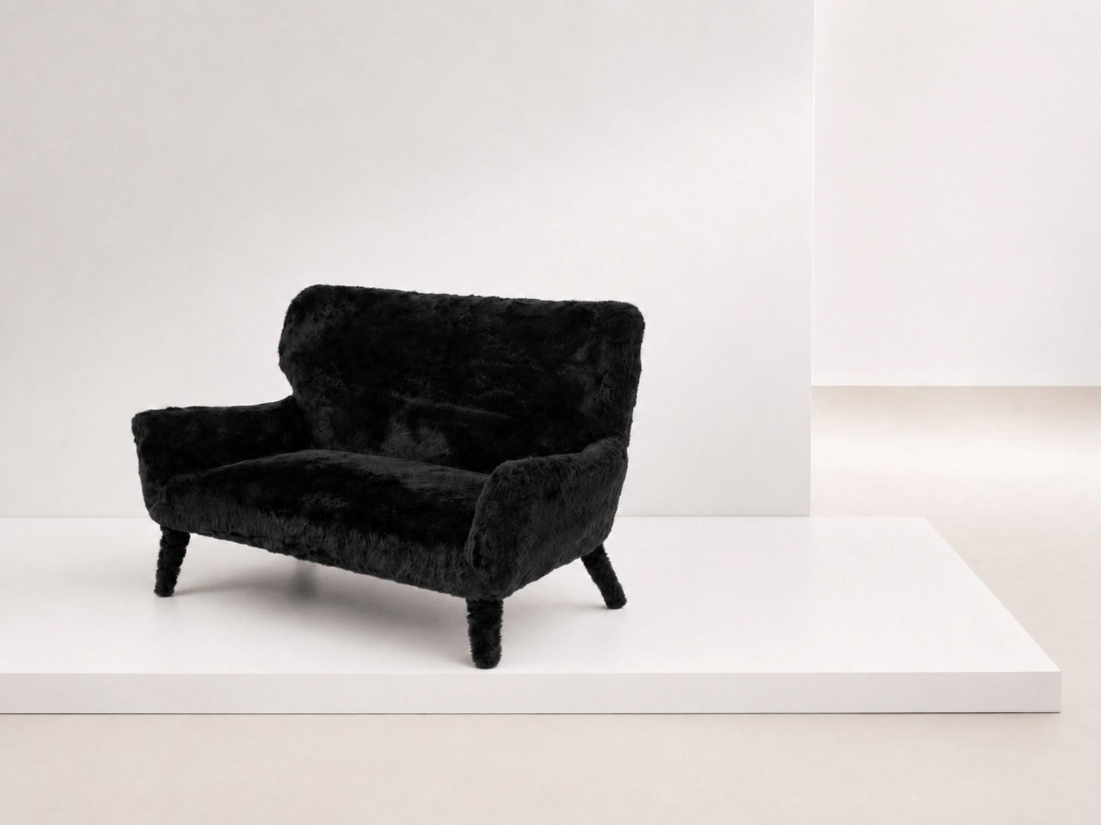 Manifattura Italiana Faux Fur Sofa: Height: 87 cm Width: 143 cm Depth: 70 cm Seat height: 38 cmGorgeous vintage sofa made in the 1950s, Italian manufacture.The sofa is totally covered in black faux fur, very whimsical.The shapes are