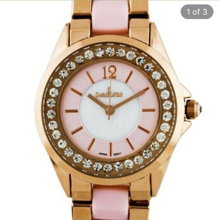 Inbox Charles Latour Pearlized Dial Core Ladies Watch: This watch for ladies and branch new condition - Charles Latour has a sleek 35 mm case with stunning Czech crystal surround the outer chapter ring- hand: stick case back type- snap; down strap colour