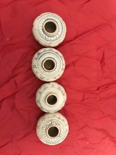 4 authentic Vietnamese Porcelain pots in 13/14 century: These 4 pots that fishermen had found in the ocean, which had been in the ocean for many centuries. They had a beautiful painting of a flower, drawn in distinctively relaxed Vietnamese strokes togethe