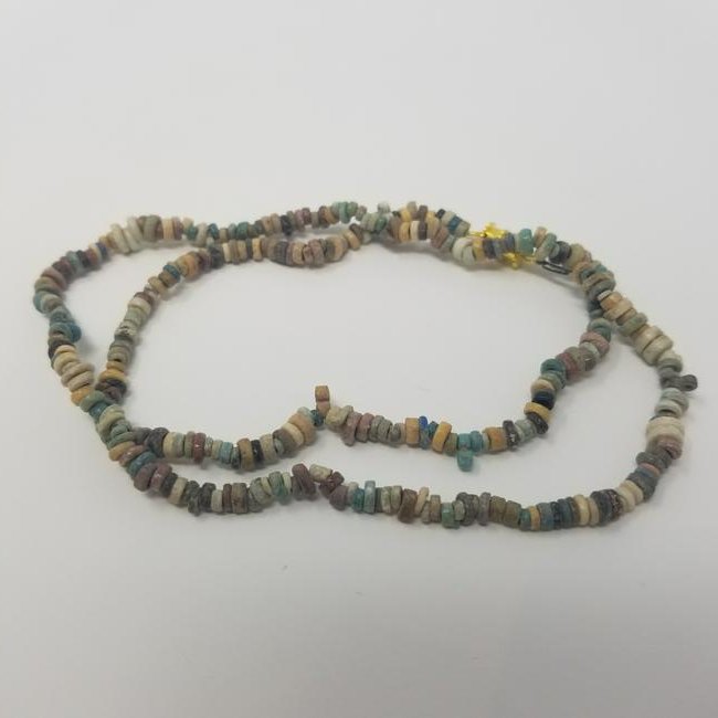 Colourful Mummy Beads - Late Period: From Ancient Egypt, a colourful faience beaded necklace. Late period, 700 BCE. Over 16" in length. Provenance: Ex. NY, USA collection acquired pre 1950s. All purchases will be accompanied by a signed 