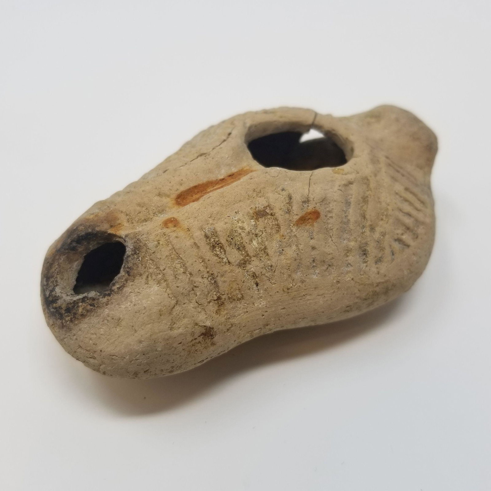 Byzantine - Oil Lamp: A terracotta oil lamp, from the Byzantine Empire. Item is chipped per image. 500 CE. Provenance - ex. London UK Gallery All purchases will be accompanied by a signed Certificate of Authenticity. Items