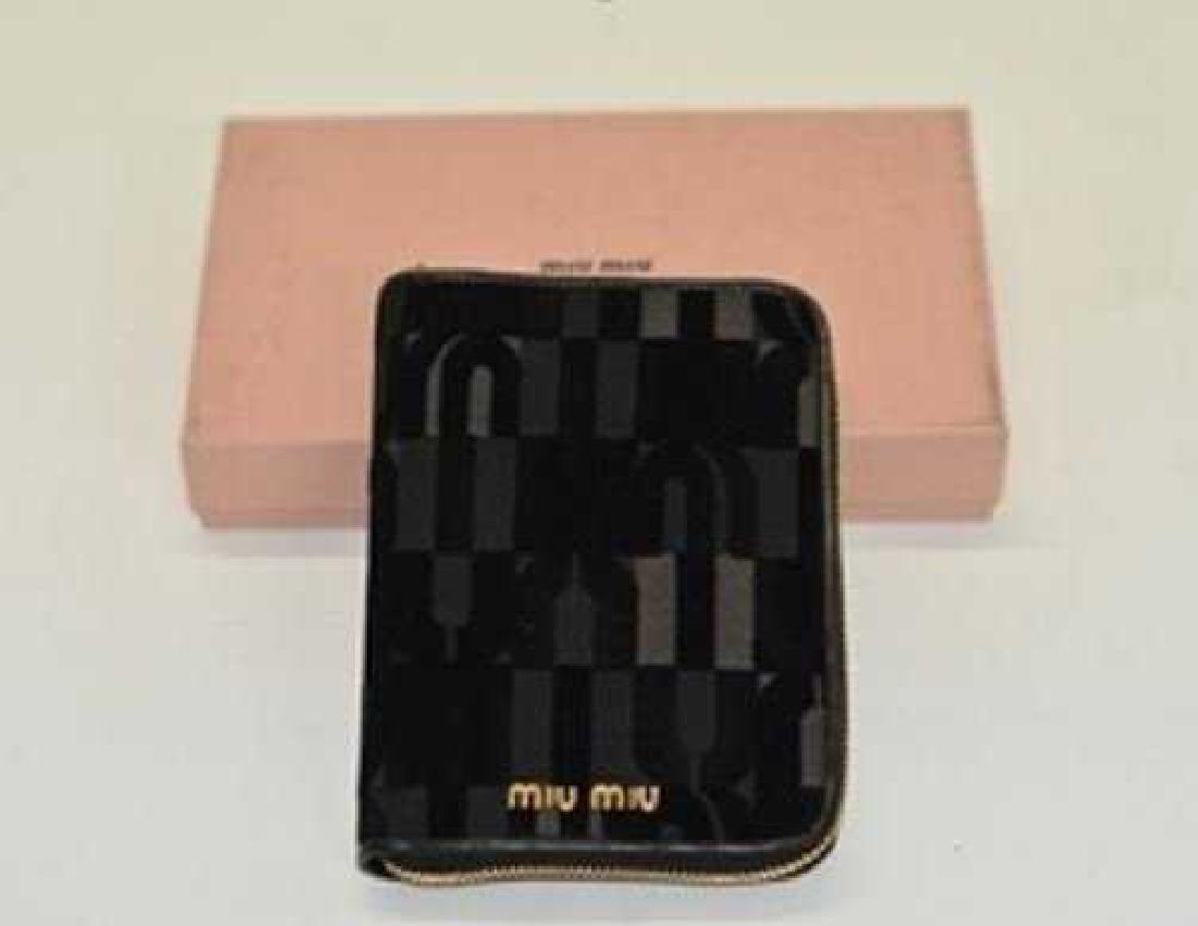 New Miu Miu Ladies Agenda with zipper: Brand: Miu Miu New! Style: Ladies Agenda with zipper ST.COCCO LUX Color: Black Made in Italy