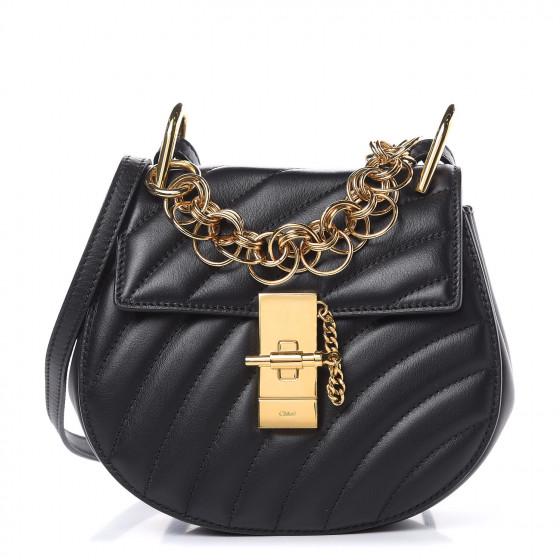 CHLOE Calfskin Quilted Shoulder Bag: Brand: Chloe Style: CHLOE Calfskin Quilted Mini Drew Bijou Shoulder Bag Black Details: Messenger style bag is crafted of luxuriously quilted calfskin leather in black. The bag features a short polishe