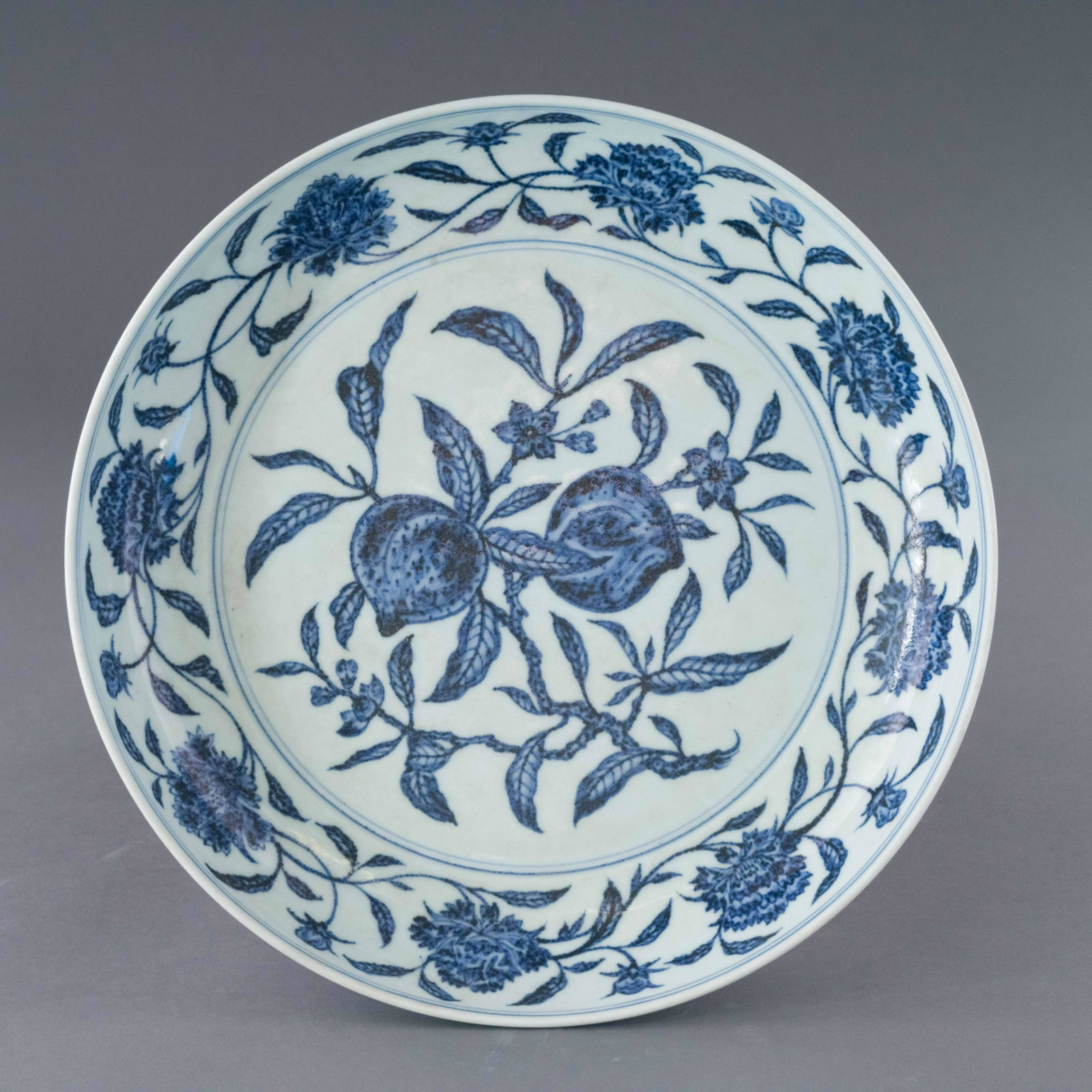 XUANDE BLUE & WHITE FRUIT ABUNDANT PLATE: Dimensions: Height: 2.375 inch x Width/Diameter: 12.625 inch x Length/Depth: 12.625 inch Dimensions in Centimeter: 6 cm x 32.1 cm x 32.1 cm Rare, Chinese Ming Dynasty Xuande Blue and white fruit abund