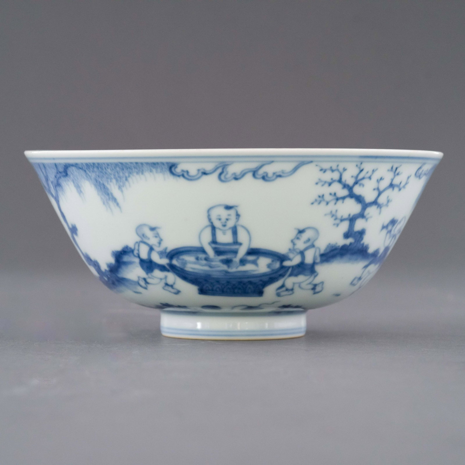 MING YONGLE BLUE & WHITE BOYS MOTIF BOWL: Dimensions: Height: 2.75 inch x Width/Diameter: 6.125 inch x Length/Depth: 6.125 inch Dimensions in Centimeter: 7 cm x 15.6 cm x 15.6 cm Chinese Ming Dynasty Yongle blue and white boys motif porcelain