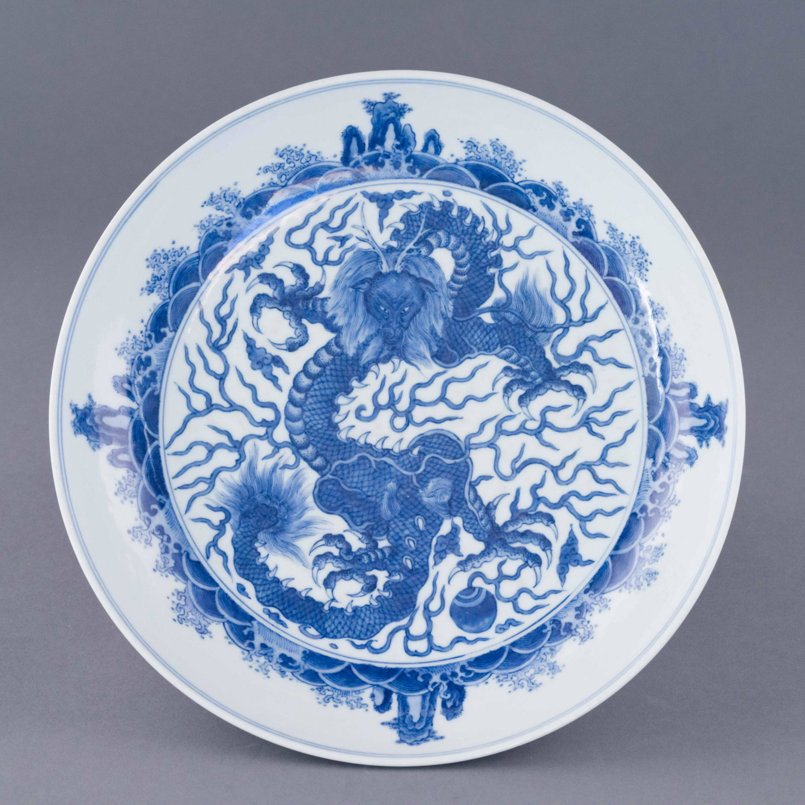 MING CHONGZHEN BLUE & WHITE DRAGON PATTERN PLATE: Dimensions: Height: 2.25 inch x Width/Diameter: 10.5 inch x Length/Depth: 10.5 inch Dimensions in Centimeter: 5.7 cm x 26.7 cm x 26.7 cm Superb, Chinese Ming Dynasty Period, Chongzhen blue and white d