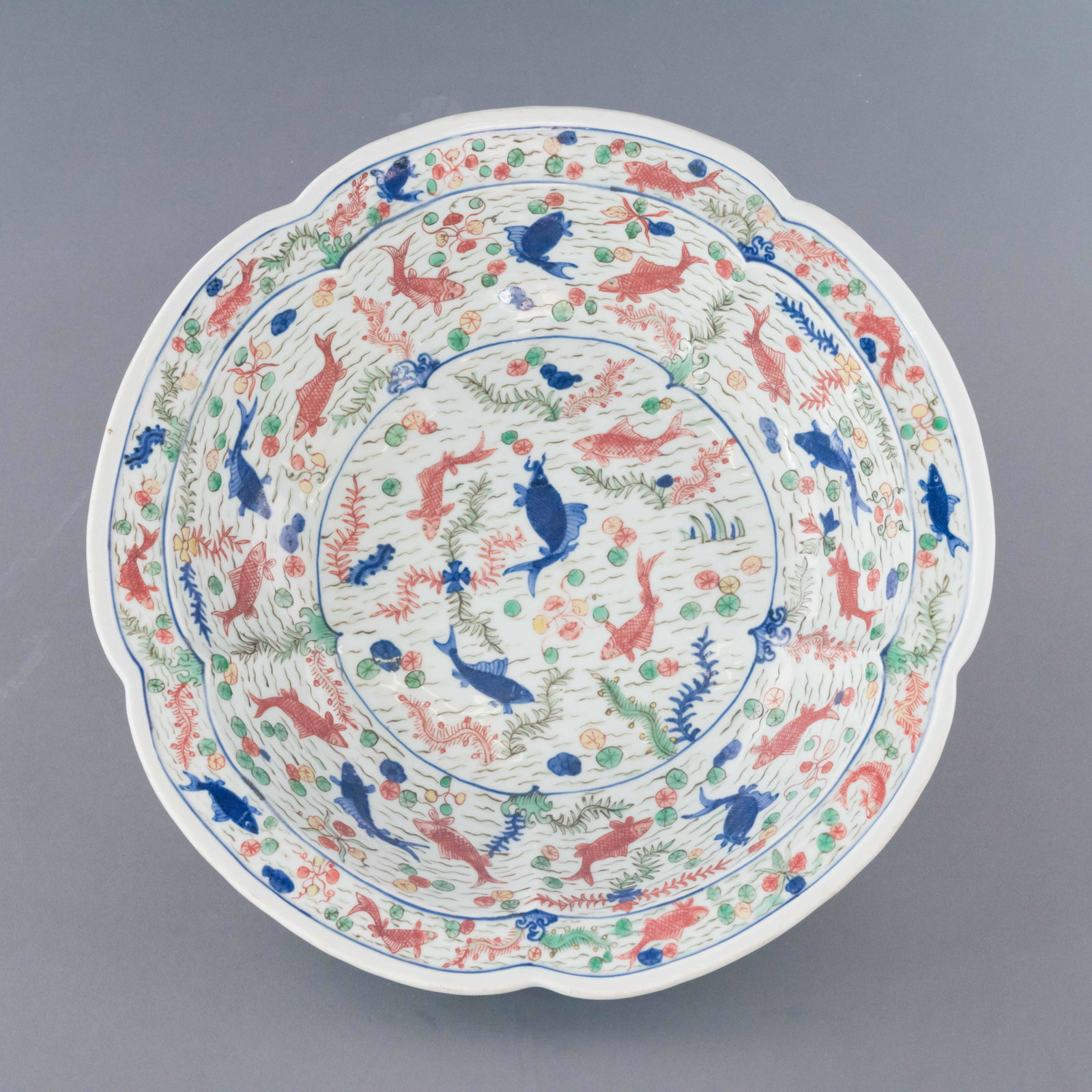 WANLI WUCAI FLORI FORM BOWL: Dimensions: Height: 3.5 inch x Width/Diameter: 14.875 inch x Length/Depth: 14.875 inch Dimensions in Centimeter: 8.9 cm x 37.8 cm x 37.8 cm Chinese Ming Dynasty Wanli Wucai flori form porcelain bowl. 