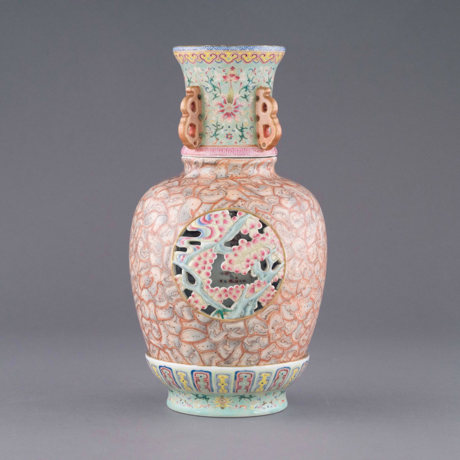 QIANLONG PIERCED FAMILLE ROSE AMPHORA VASE: Dimensions: Height: 11.75 inch x Width/Diameter: 6.25 inch x Length/Depth: 6.25 inch Dimensions in Centimeter: 29.8 cm x 15.9 cm x 15.9 cm Extraordinary, Lustrous, Chinese Qing Dynasty Qianlong pierce