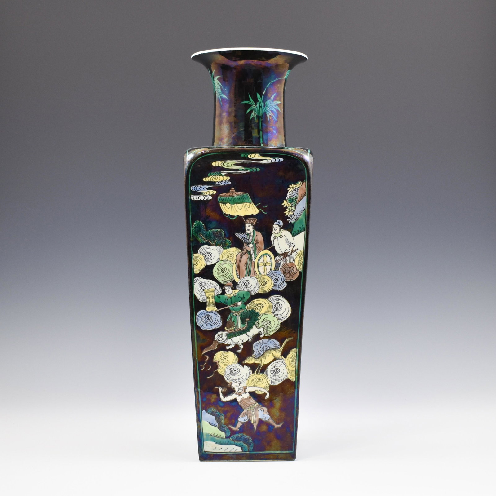 CHINESE KANGXI FAMILLE NOIRE SQUARE VASE: Dimensions: 21-1/2" H x 6-3/4" W Chinese Kangxi Famille Noir Square Vase. Squared baluster body, flat shoulder, base, and opening. Cylindrical neck, slightly waisted to flared rim. Hand painted decora