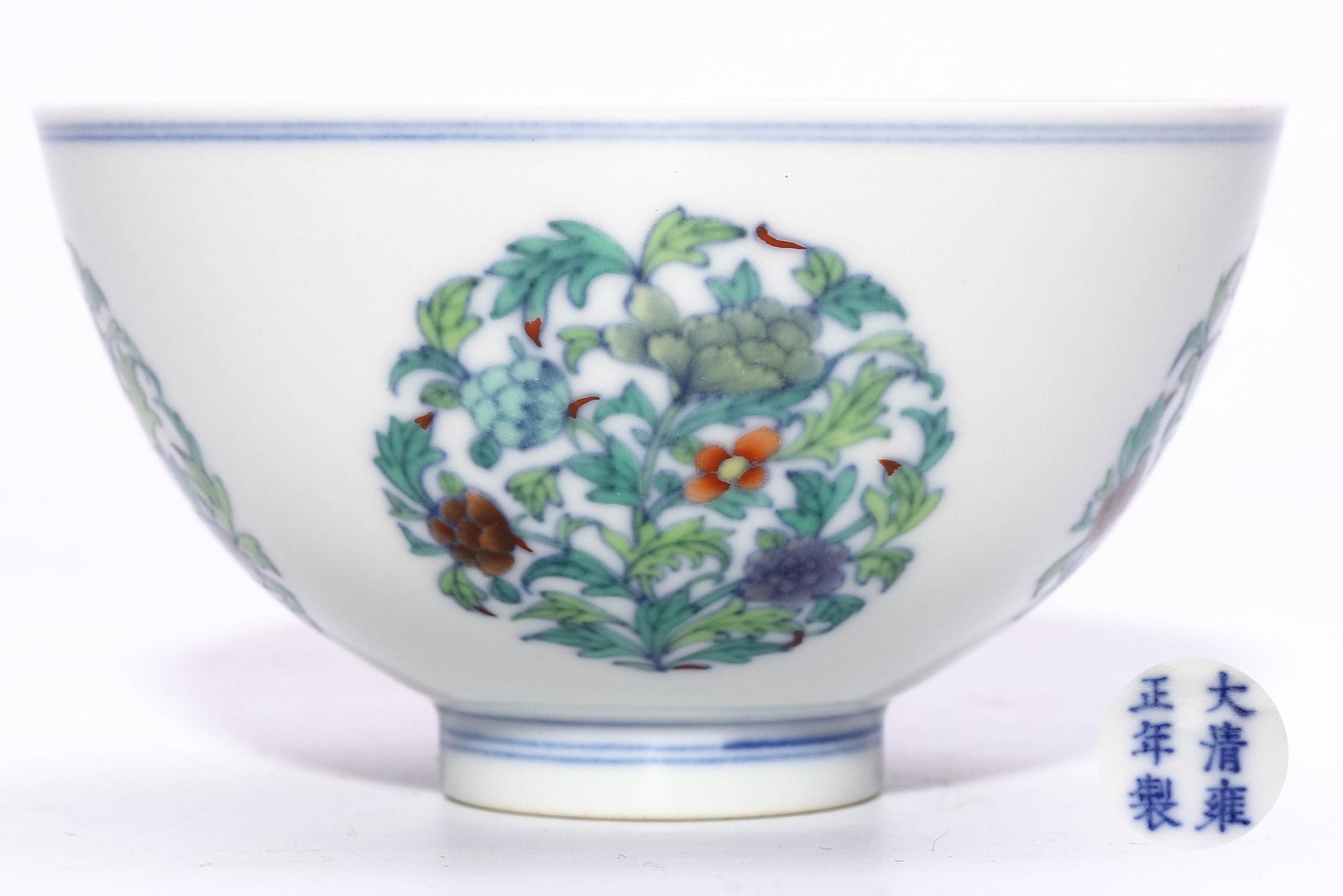 A CHINESE PORCELAIN BOWL: A Chinese Doucai Glazed Floral Medalion Porcelain Bowl. 清:雍正斗彩团花碗 Dimensions: H 6.5cm, D 11.6cm PROVENANCE: Arlin Holmes (April 1951 - May 2019)