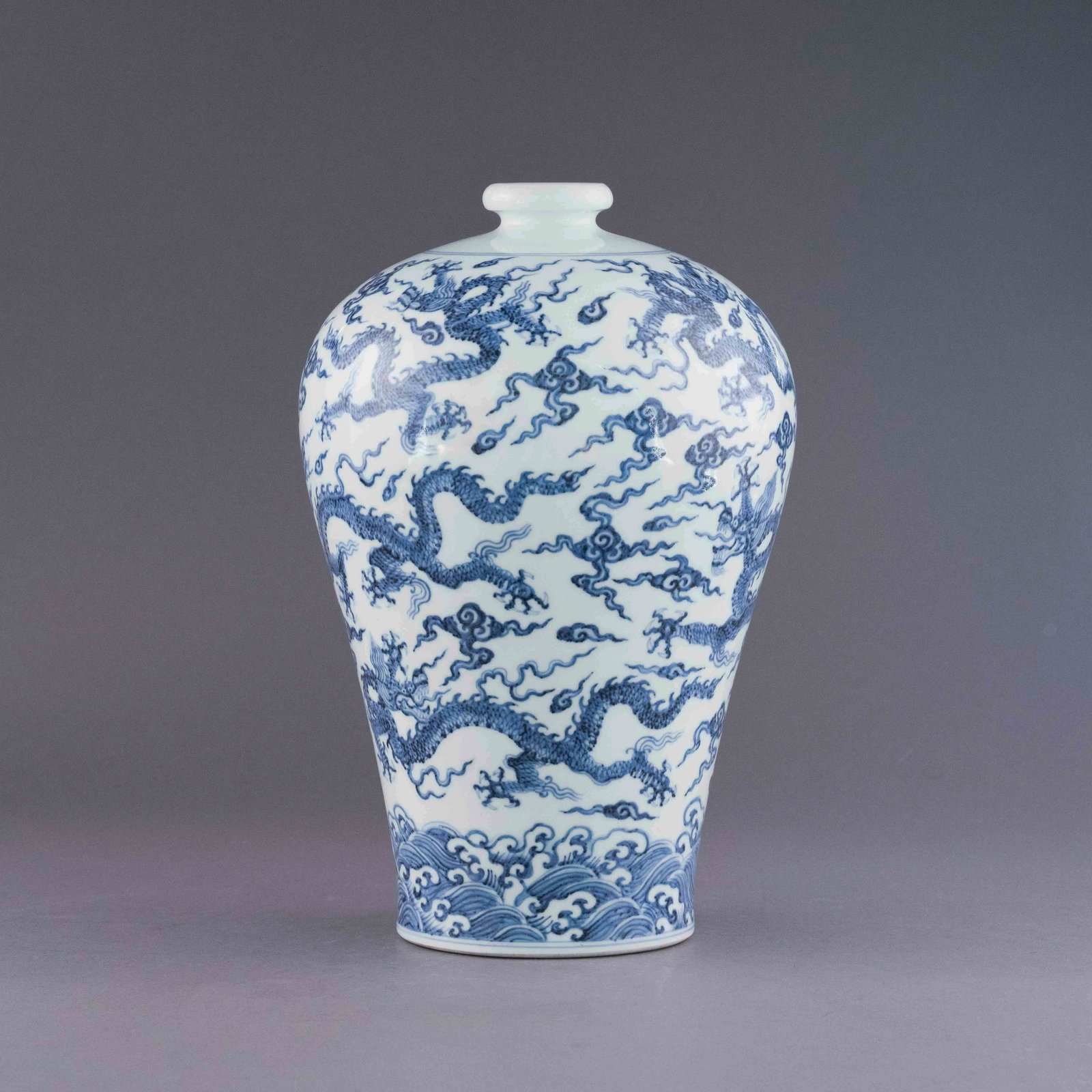 MING BLUE AND WHITE DRAGON MEIPING JAR: Chinese Ming Dynasty Period, blue and white dragon meiping porcelain jar. The porcelain shaped into a traditional Meiping form, large, thick and tall potted, wide body on the shoulder. Slender neck ea