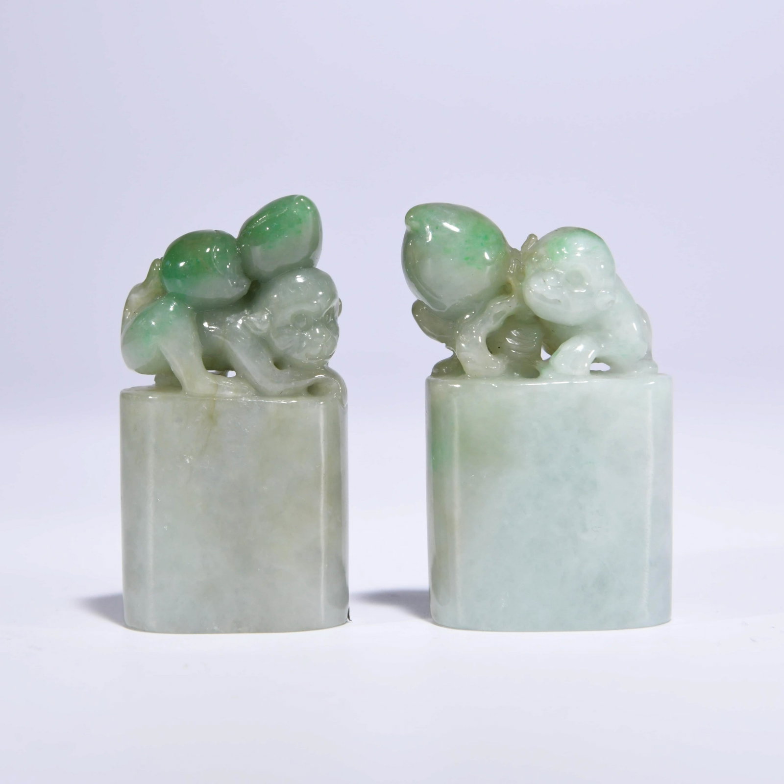 APAIR OF CHINESE JADEITE SEALS: Apair of Chinese Jadeite Seals. Dimensions: Lg: 3.1cm; Wd: 1.9cm; Ht: 5.5cm