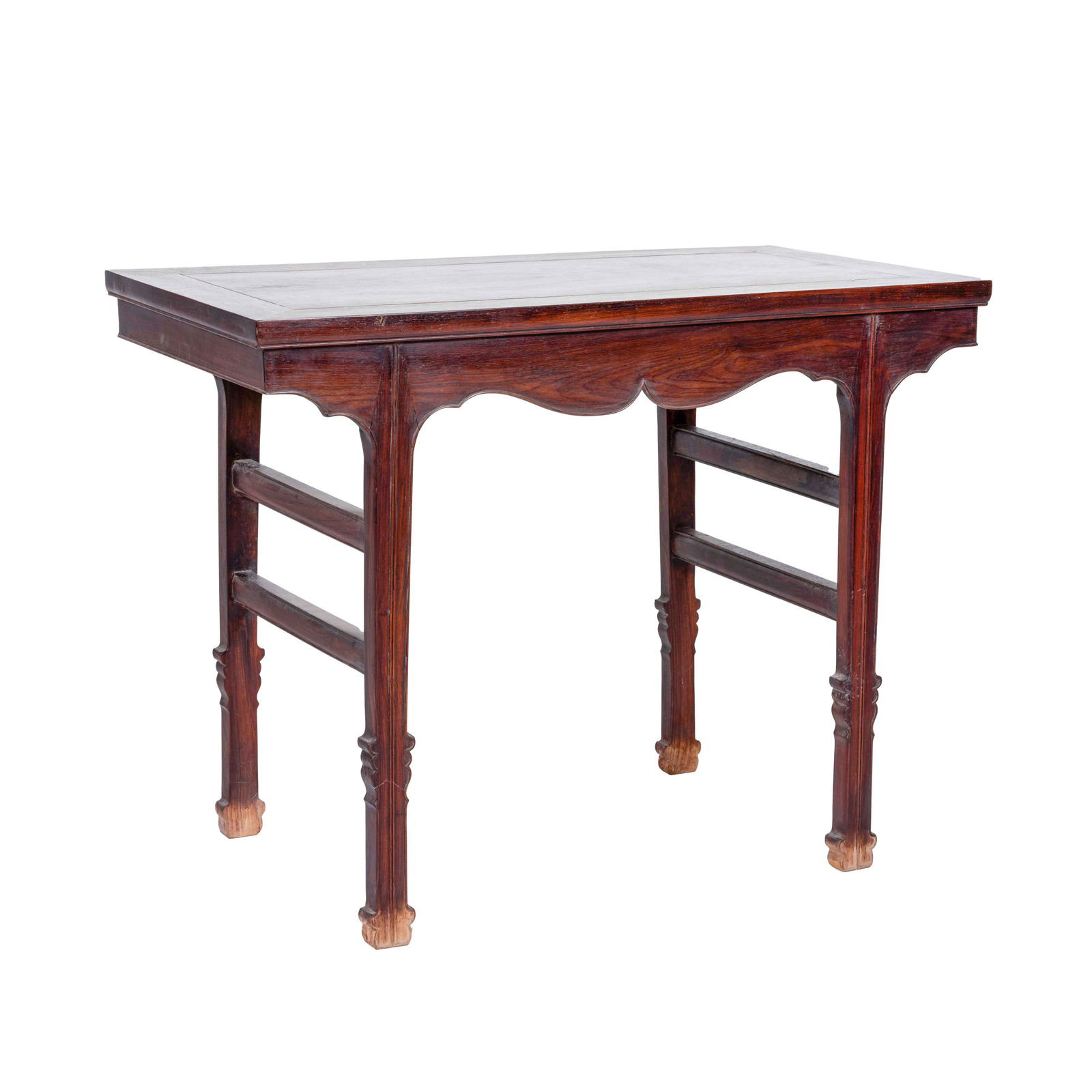 ANTIQUE CHINESE HUANGHUALI ALTAR TABLE: Chinese Antique Huanghuali altar table, constructed from a rectangular top surmounted from a scalloped apron. Terminating the open-works carved ruyi shaped spandrels flanked over four shaped legs, and