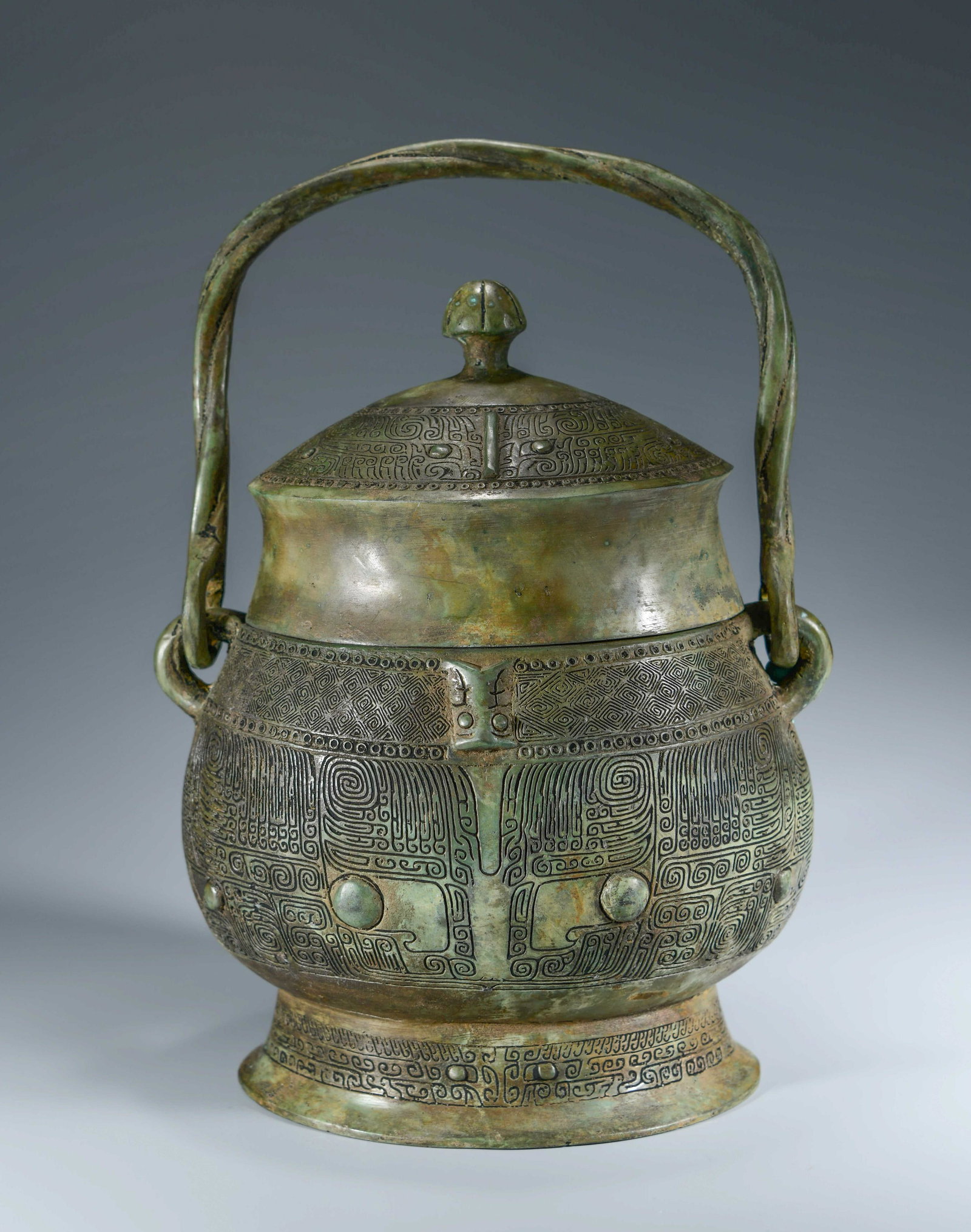 A Taotie Loop-Shanle Bronze Ewer: Dimensions: Height: 32cm Length: 22cm Width: 13cm A Taotie Loop-Shanle Bronze Ewer