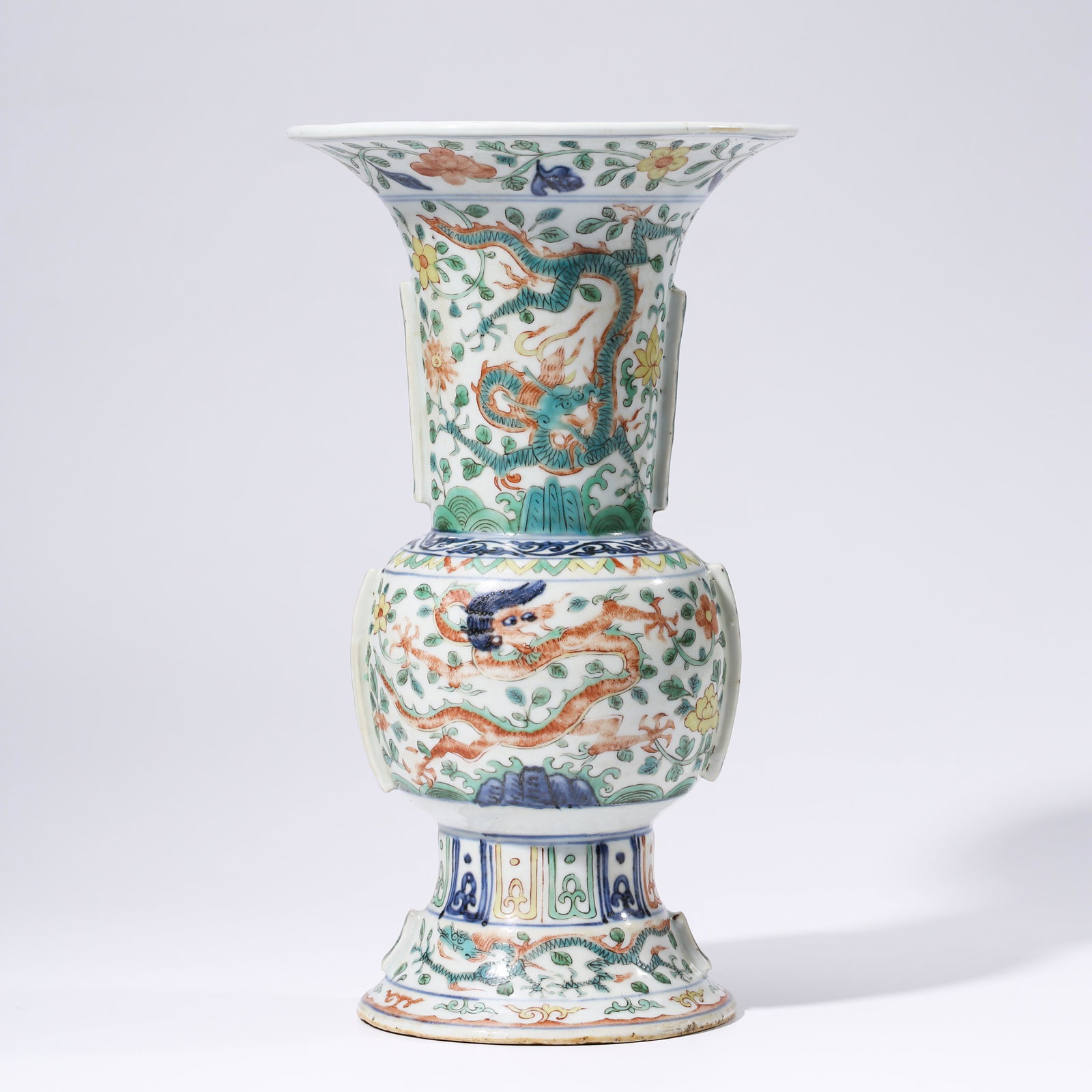 A CHINESE WUCAI PORCELAIN VASE MARKED WAN LI: Dimensions: Diam.17.2cm, Height: 30.1cm, PROVENANCE: From the estate of William Schultz (1934 - 2018) of Alpharetta, Georgia. A Veteran, Private collectors. The vase has a flared neck and a flared foo