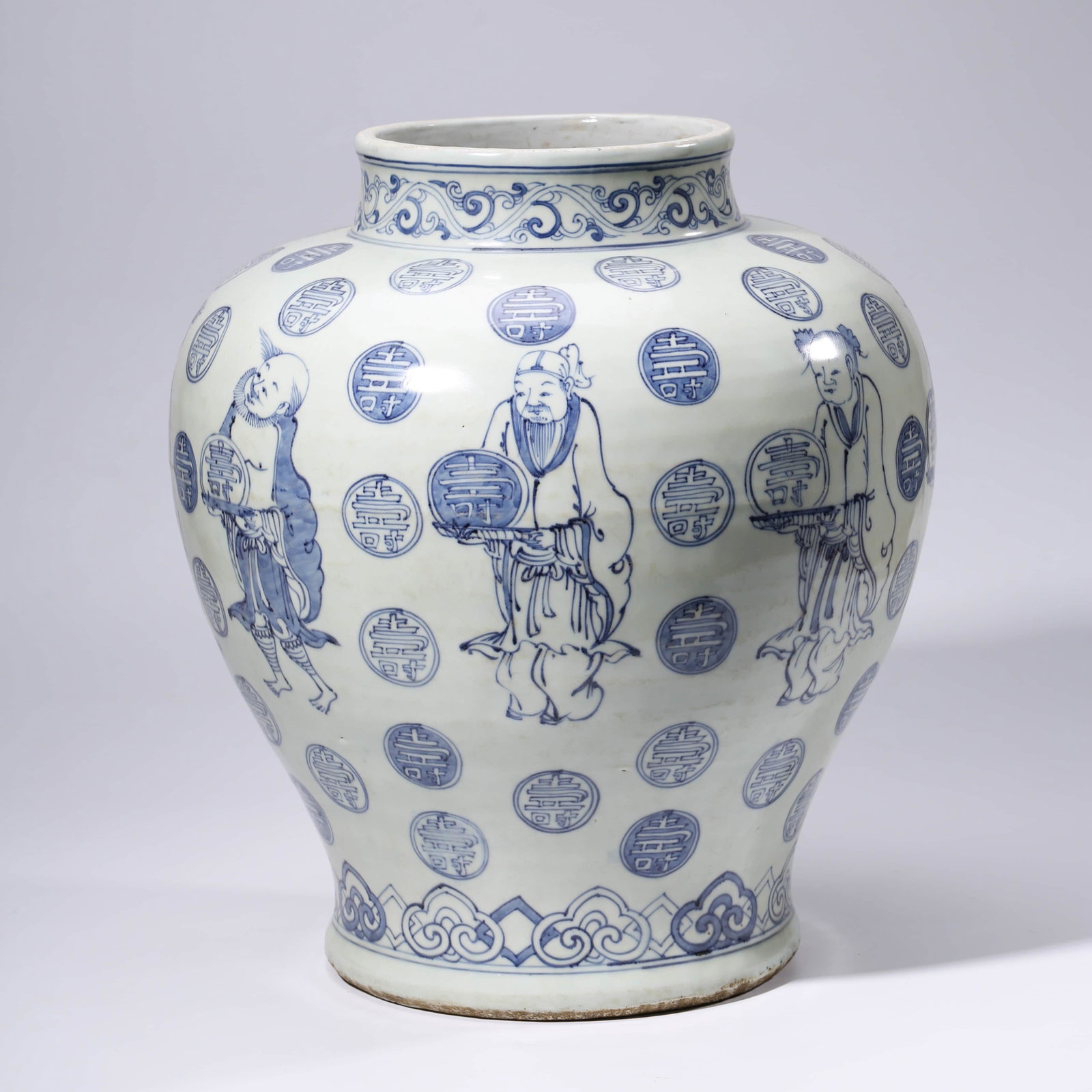 A CHINESE BLUE & WHITE PORCELAIN JAR MARKED WAN LI: Dimensions: Diam.39.7cm, Height: 43.5cm, The jar is densely decorated with immortals. The vase is superbly potted with rounded shoulders supporting a waisted neck and tapering down to a broad base.
