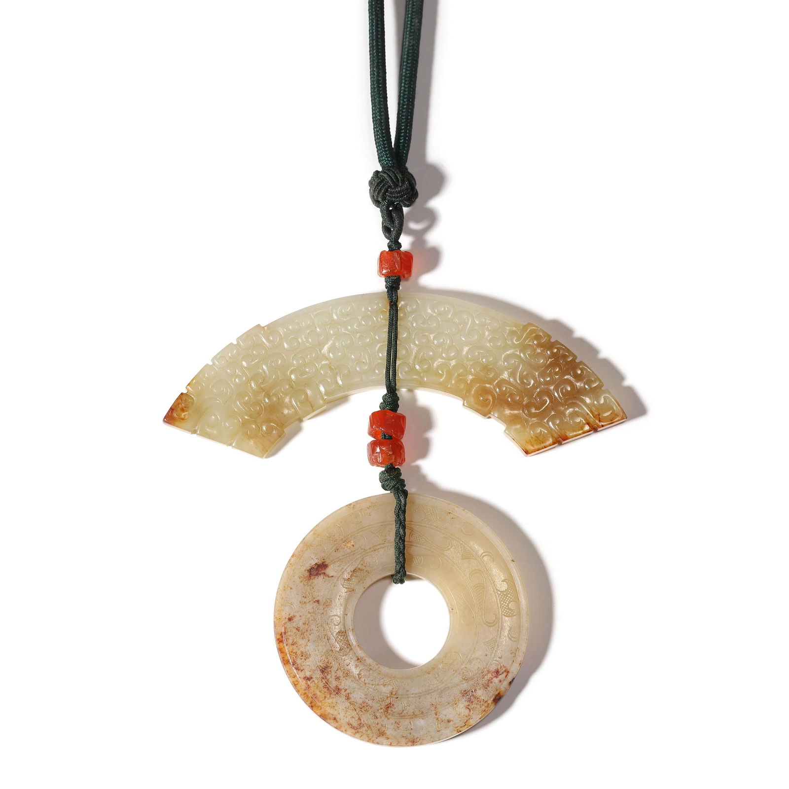 A Set of Two Carved Russet Jade Pendants (1 of 6)