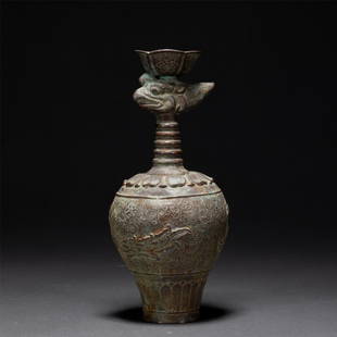 A CHINESE SILVER VASE: A CHINESE SILVER VASE Weight 430 gram. Casting in a pear shaped body, waisted neck, bird from cover, the exterior decorated with phoenix among floral scrolls, with malachite and reddish