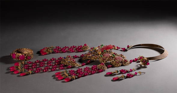 A SET OF CHINESE GILDING ORNAMENTS: A SET OF CHINESE GILDING ORNAMENTS 40 cm W x 60 cm H x Weight 700 gram. The curved necklace hanged a flowers group pendant, which inset with hard stones, further beaded tassels hanging from