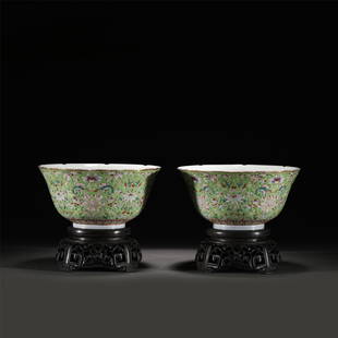 A PAIR OF FAMILLE ROSE FLOWERS PORCELAIN BOWLS: A PAIR OF FAMILLE ROSE FLOWERS PORCELAIN BOWLS 16 cm L x 7.5 cm H The deep rounded sides rising from a straight round foot to an everted rim, the exterior painted in floral scrolls in famille