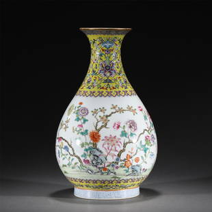 A FAMILLE ROSE FLOWERS PORCELAIN VASE,DAOGUANG: A FAMILLE ROSE FLOWERS PORCELAIN VASE,DAOGUANG 18 cm Diam x 28.6 cm H x Weight 1590 gram. Pear shaped vessel raising from a short foot, finely painted with floral branches on globular body,