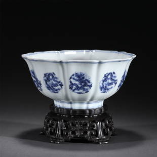 A BLUE AND WHITE PORCELAIN BOWL,XUANDE: A BLUE AND WHITE PORCELAIN BOWL,XUANDE 19 cm Diam x 14 cm H x Weight 580 gram. The deep, slightly flared sides of the bowl is subtly moulded as petals rising to a slightly everted rim.