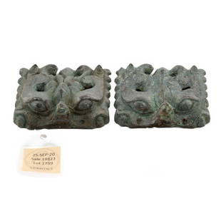 A PAIR OF BRONZE TAOTIE MASKS SIX DYNASTIES PERIOD (AD 220-589): Measurements: 2 ¾ in. (7 cm.) wide, cloth box Acquired from CHRISTIE'S March 2021, Sale 18823, Chen Hui-Lin, 15 April 1988. The Irving Collection, New York. Lot# 1759 A PAIR OF BRONZE TAOTIE