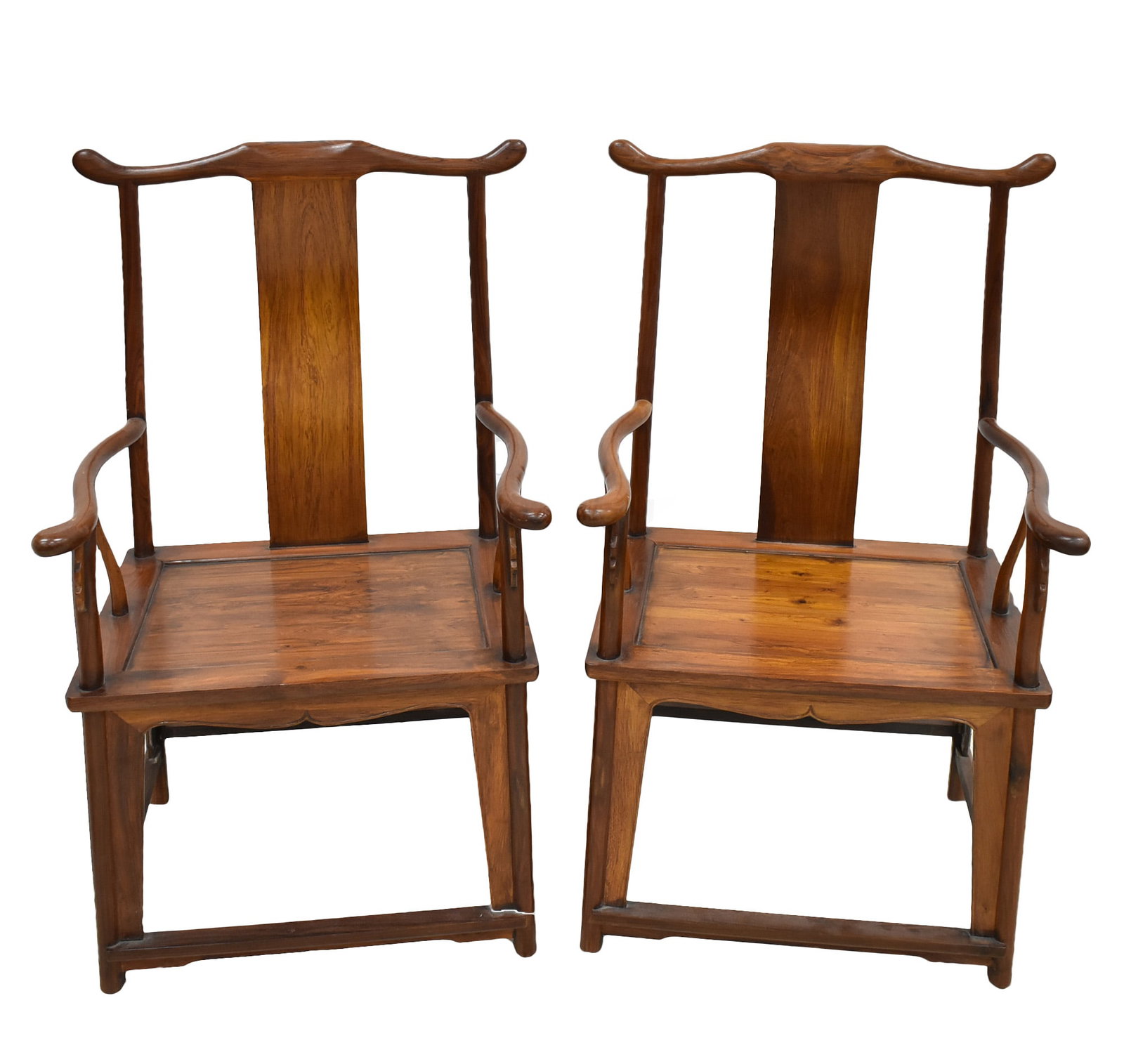 PAIR OF HUANGHUALI OFFICER HAT ARMCHAIRS: Dimensions: Height: 46-3/4", Width: 27", Depth: 20-1/2" A RARE PAIR OF HUANGHUALI OFFICIAL'S HAT ARMCHAIRS, GUANMAOYI Each has a curved, protruding crest rail supported on an S-shaped splat and elegan