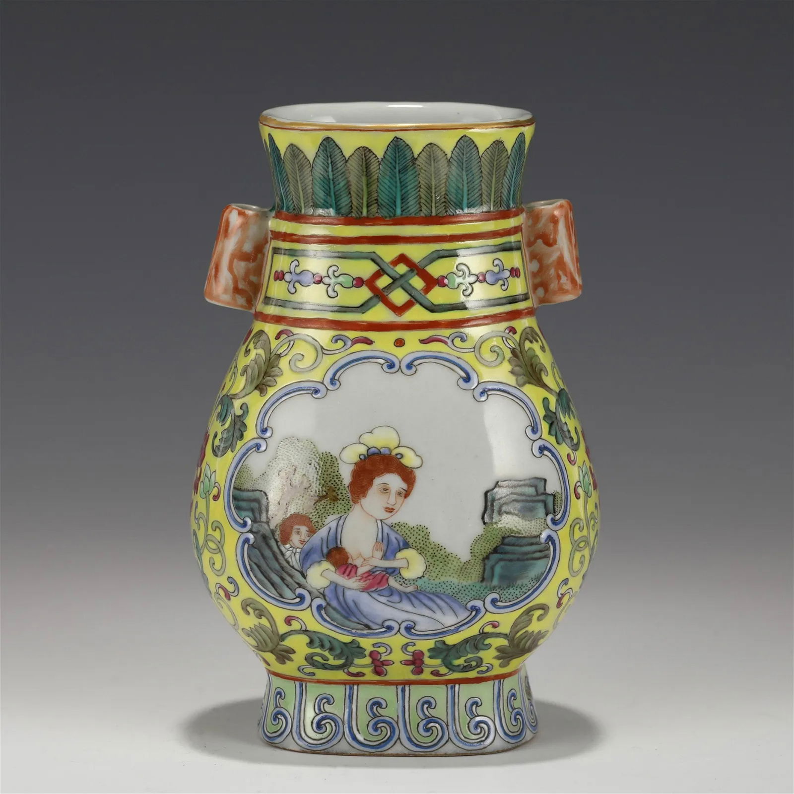QIANLONG FAMILLE ROSE PORCELAIN VASE: Measurements: Height: 13.5 cm, Diam.: 8.5 cm Chinese Qing Dynasty QianLong Famille Rose Porcelain Vase. The Porcelain potted in a amphora shaped vase, globular oval body, rounded shoulder concealing g