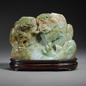 A CARVED JADEITE DECORATION